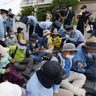 【動画あり】「戦争二度と」公道使用に抗議の座り込み　日米共同訓練、うるまと嘉手納で住民が阻止行動　