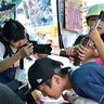 「1枚1枚が力強い」子どもの表情を追った沖縄・浦添工業の作品が好評　全国高校写真選手権大会